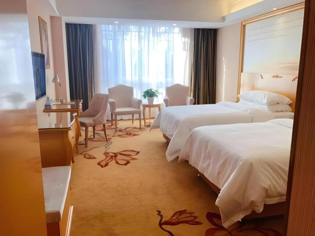 Bed in Vienna Hotel Guangxi Guilin Gongchengtianjie