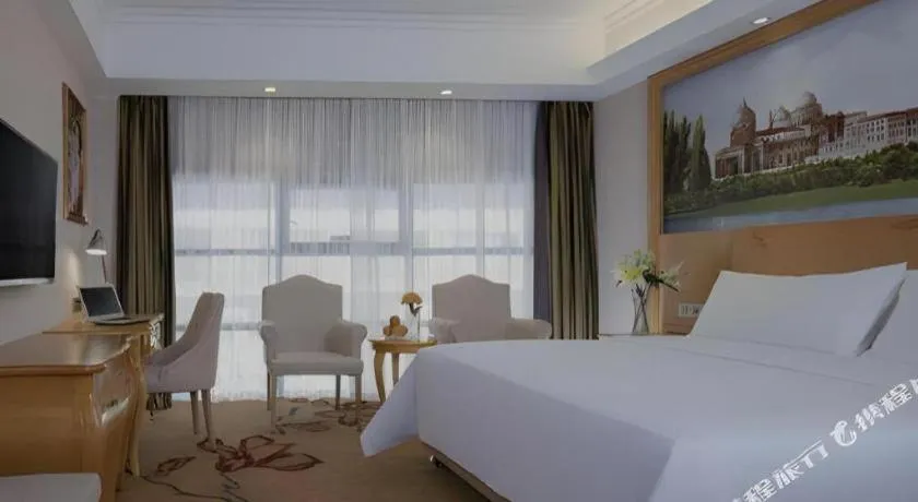 Bed in Vienna Hotel Guangxi Guilin Gongchengtianjie