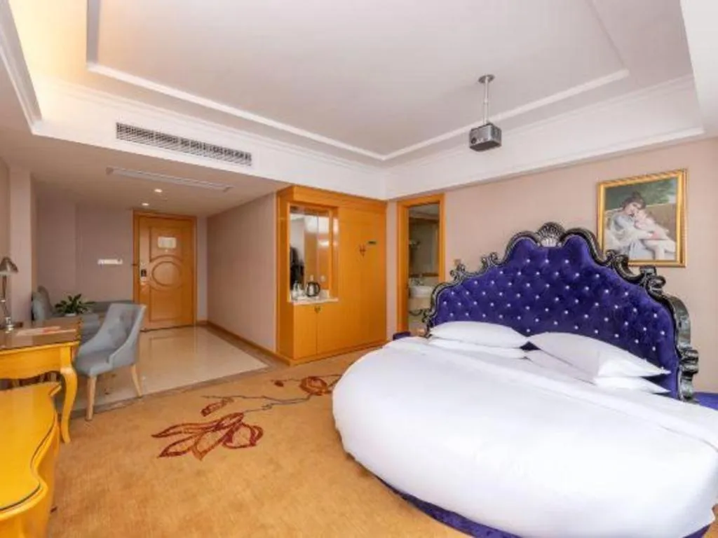 Bed in Vienna Hotel Guangxi Guilin Gongchengtianjie