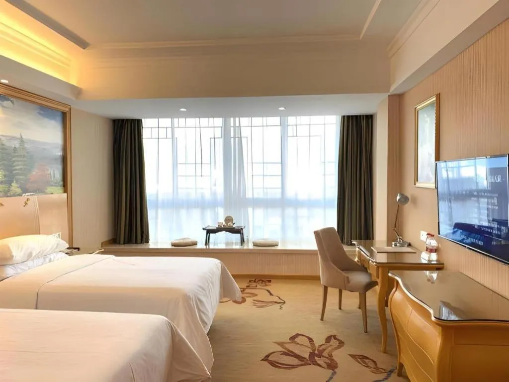 Bed in Vienna Hotel Guangxi Guilin Gongchengtianjie