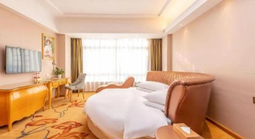 Bed in Vienna Hotel Guangxi Guilin Gongchengtianjie