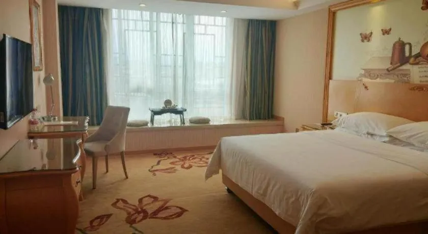 Bed in Vienna Hotel Guangxi Guilin Gongchengtianjie