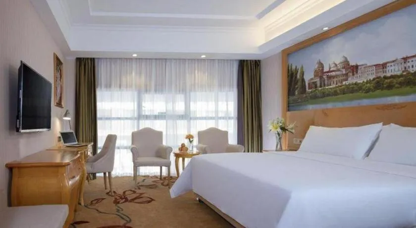 Bed in Vienna Hotel Guangxi Guilin Gongchengtianjie