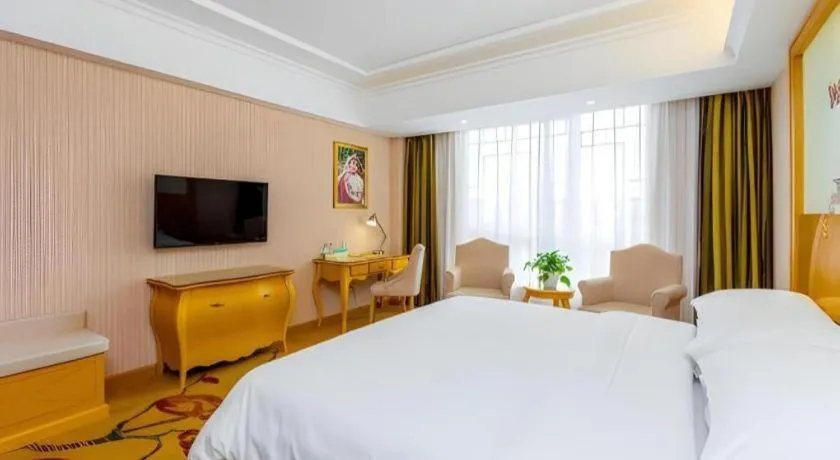 Bed in Vienna Hotel Guangxi Guilin Gongchengtianjie