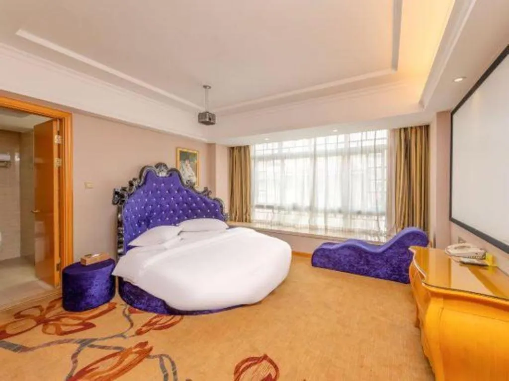 Bed in Vienna Hotel Guangxi Guilin Gongchengtianjie