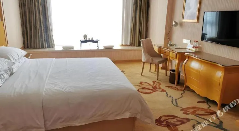 Bed in Vienna Hotel Guangxi Guilin Gongchengtianjie