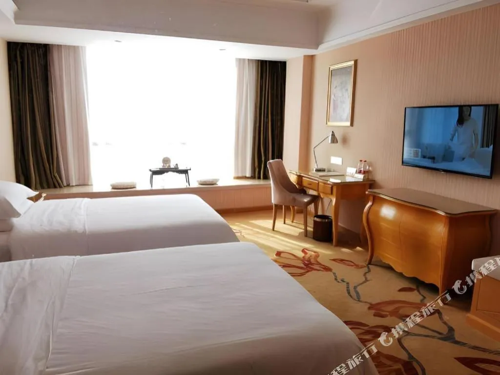 Bed in Vienna Hotel Guangxi Guilin Gongchengtianjie