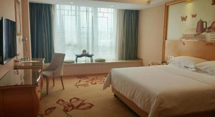 Bed in Vienna Hotel Guangxi Guilin Gongchengtianjie