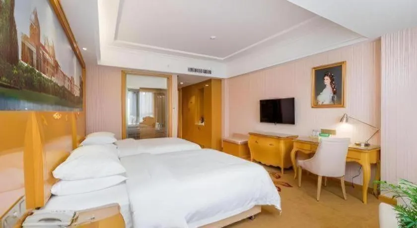 Bed in Vienna Hotel Guangxi Guilin Gongchengtianjie