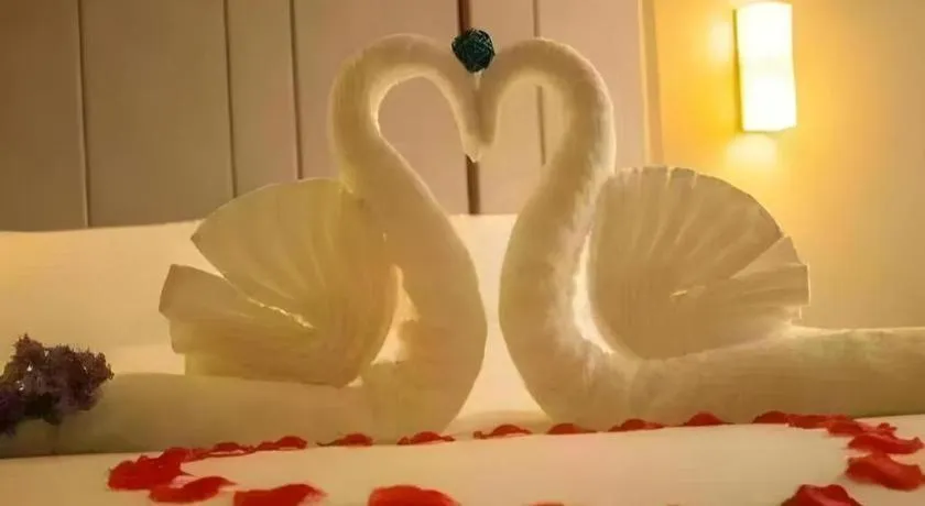 Bed in Vienna Hotel Guangxi Guilin Gongchengtianjie