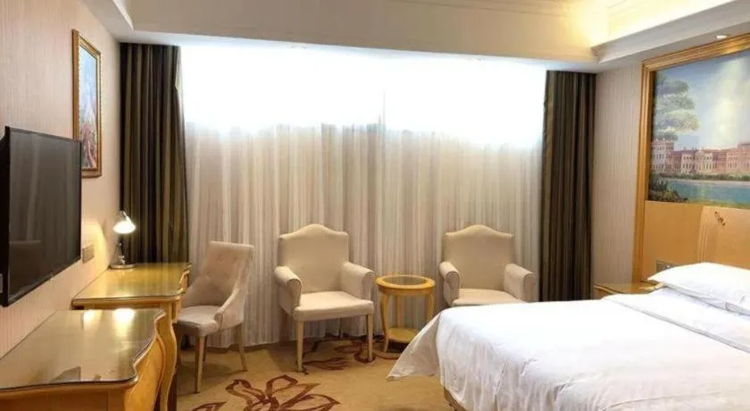 Bed in Vienna Hotel Guangxi Guilin Gongchengtianjie