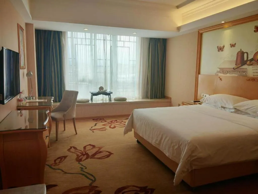 Bed in Vienna Hotel Guangxi Guilin Gongchengtianjie