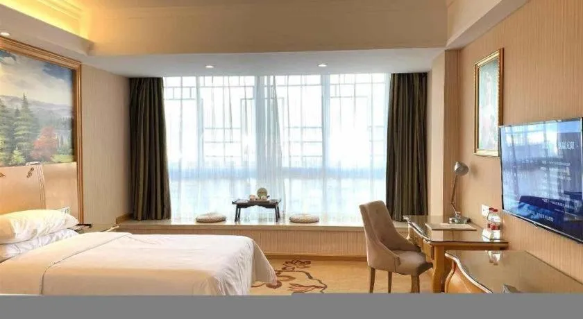 Bed in Vienna Hotel Guangxi Guilin Gongchengtianjie