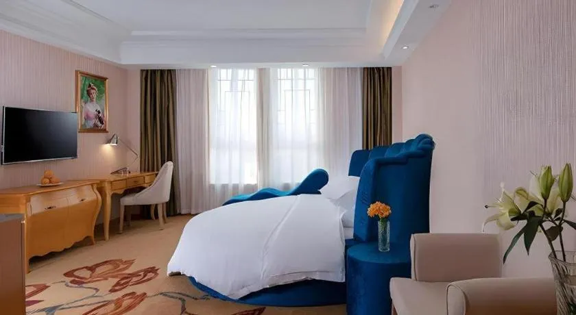 Bed in Vienna Hotel Guangxi Guilin Gongchengtianjie