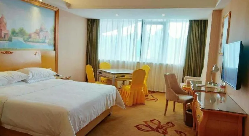 Bed in Vienna Hotel Guangxi Guilin Gongchengtianjie