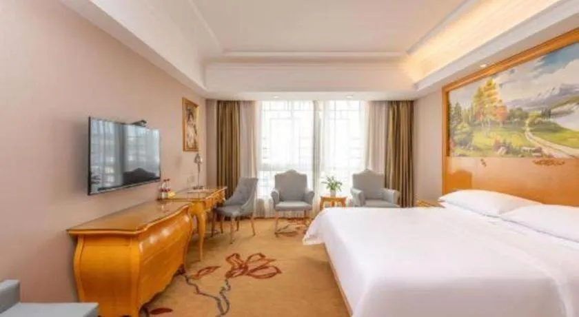 Bed in Vienna Hotel Guangxi Guilin Gongchengtianjie