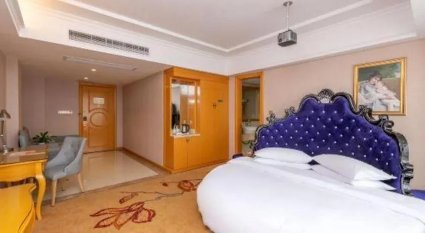 Bed in Vienna Hotel Guangxi Guilin Gongchengtianjie