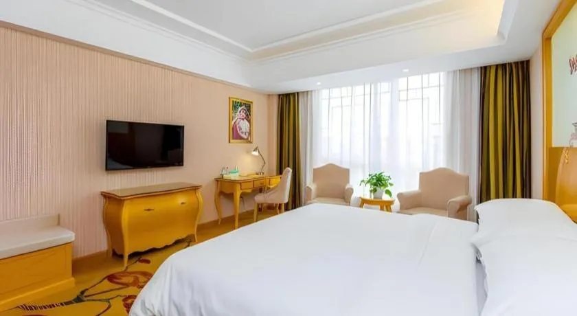 Bed in Vienna Hotel Guangxi Guilin Gongchengtianjie