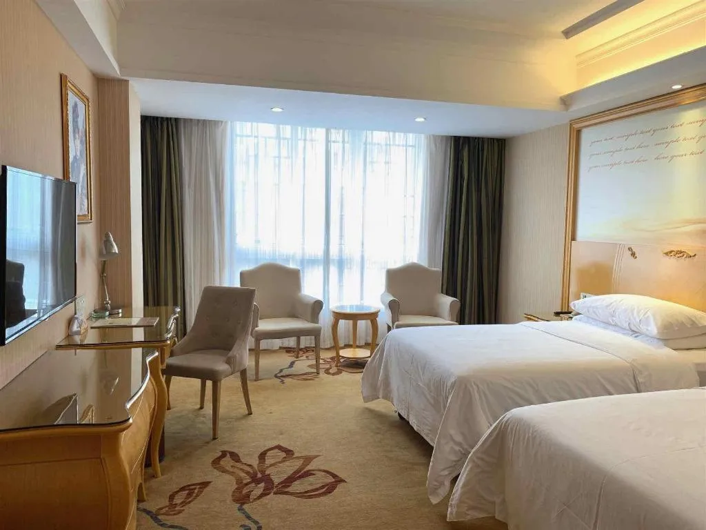 Bed in Vienna Hotel Guangxi Guilin Gongchengtianjie