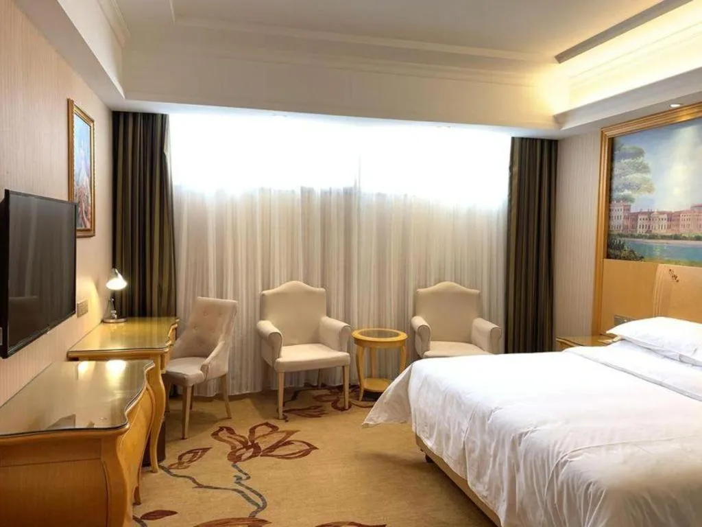 Bed in Vienna Hotel Guangxi Guilin Gongchengtianjie