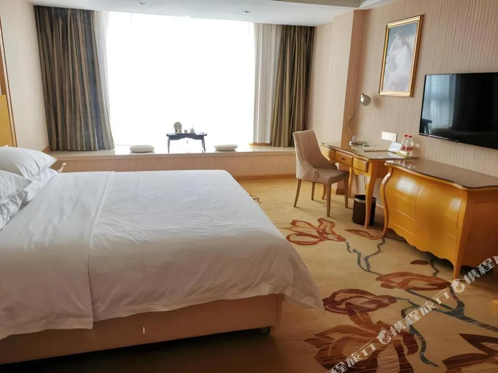 Bed in Vienna Hotel Guangxi Guilin Gongchengtianjie