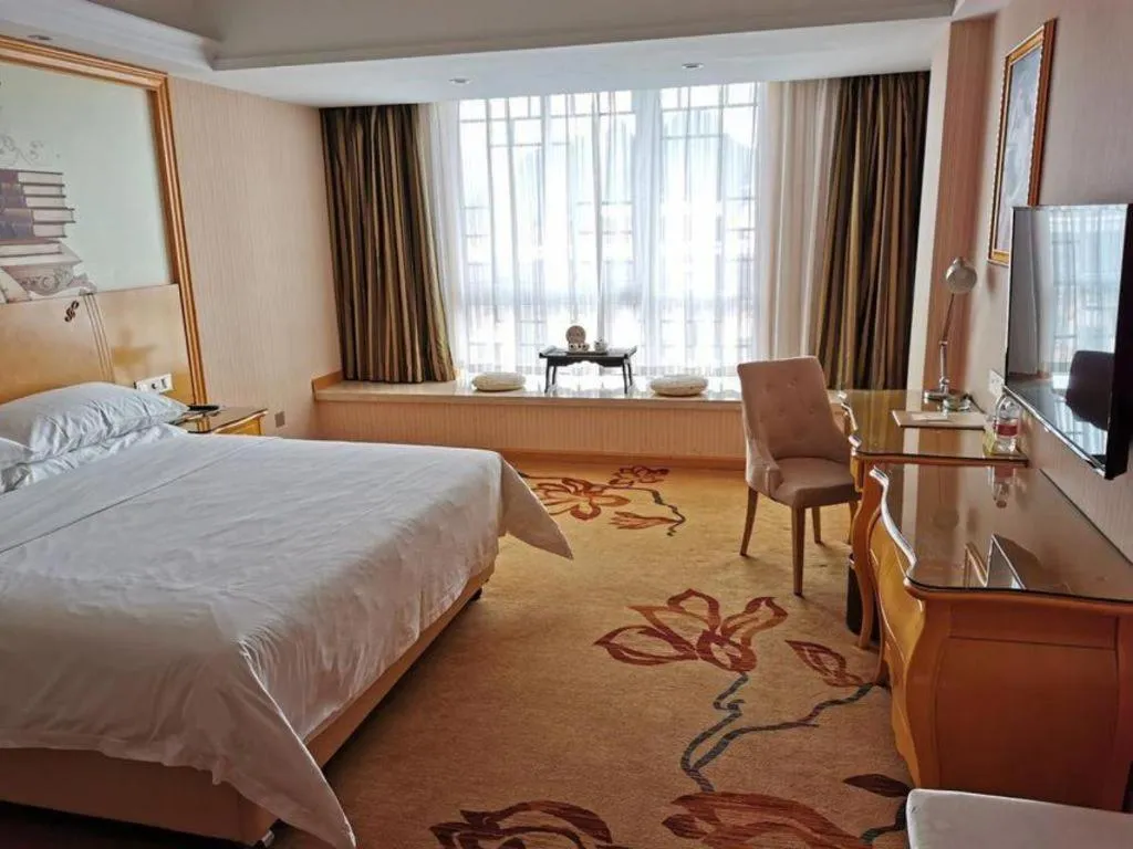 Bed in Vienna Hotel Guangxi Guilin Gongchengtianjie