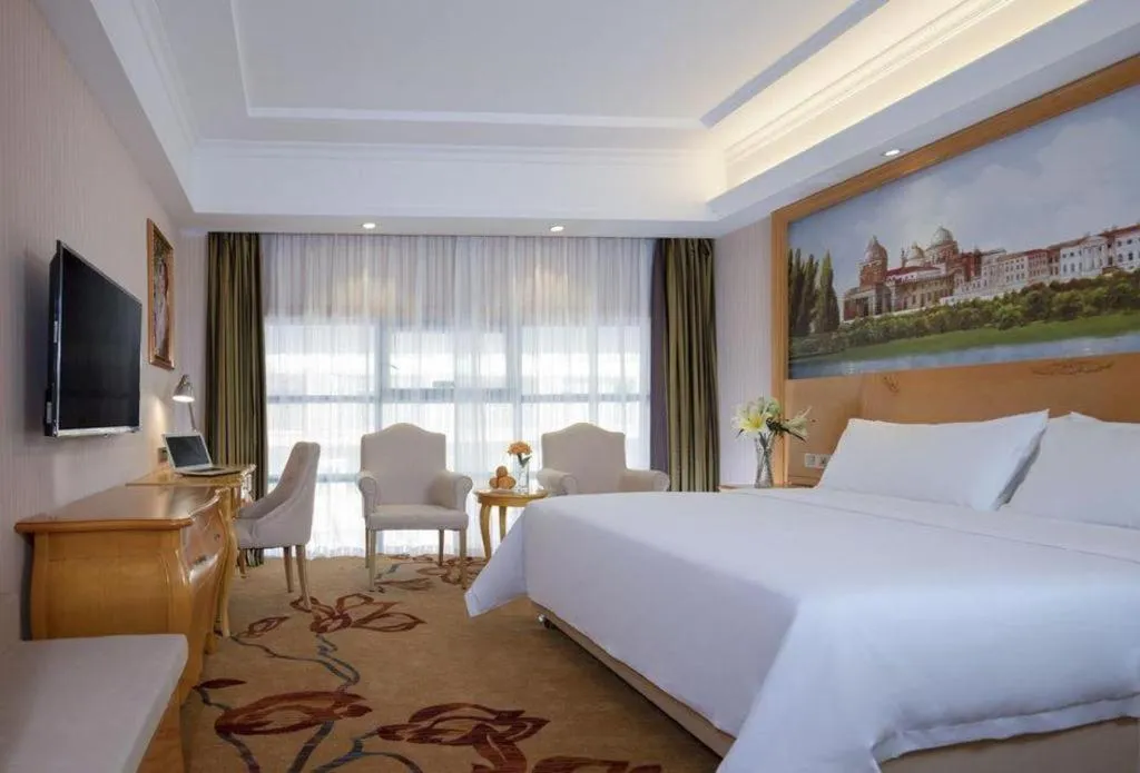 Bed in Vienna Hotel Guangxi Guilin Gongchengtianjie