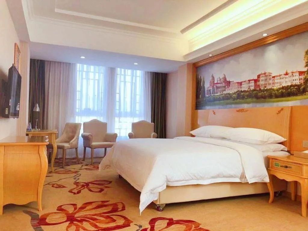 Bed in Vienna Hotel Guangxi Guilin Gongchengtianjie