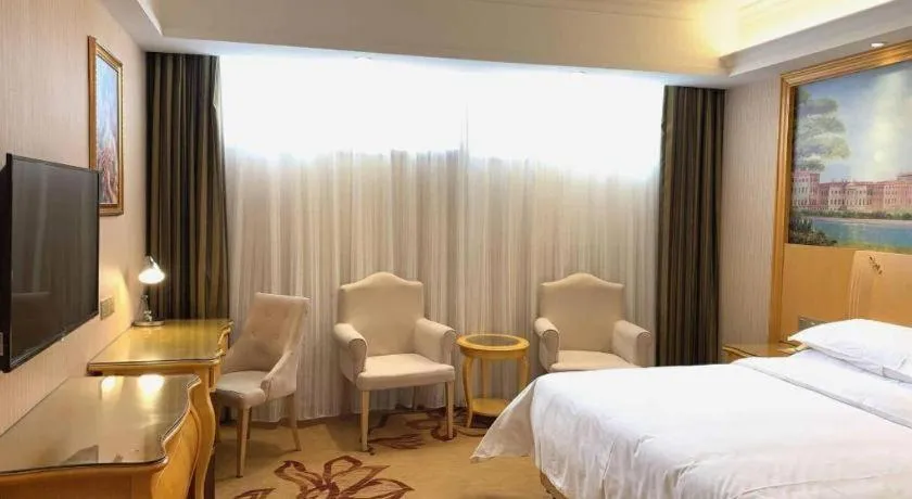 Bed in Vienna Hotel Guangxi Guilin Gongchengtianjie