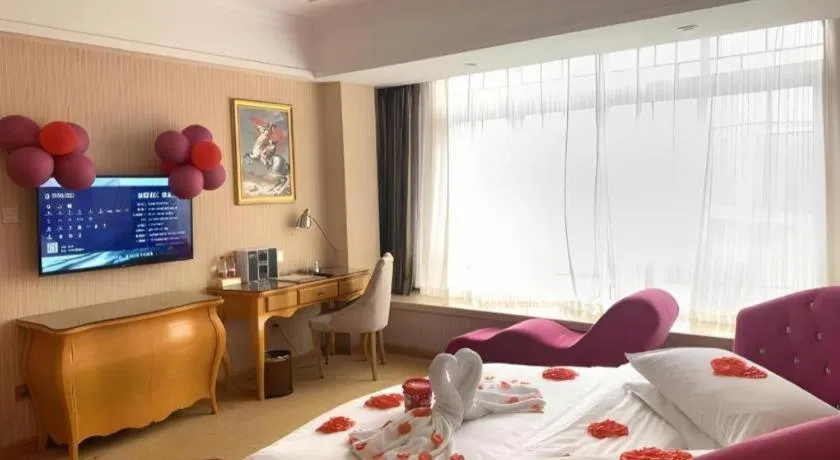 Bed in Vienna Hotel Guangxi Guilin Gongchengtianjie