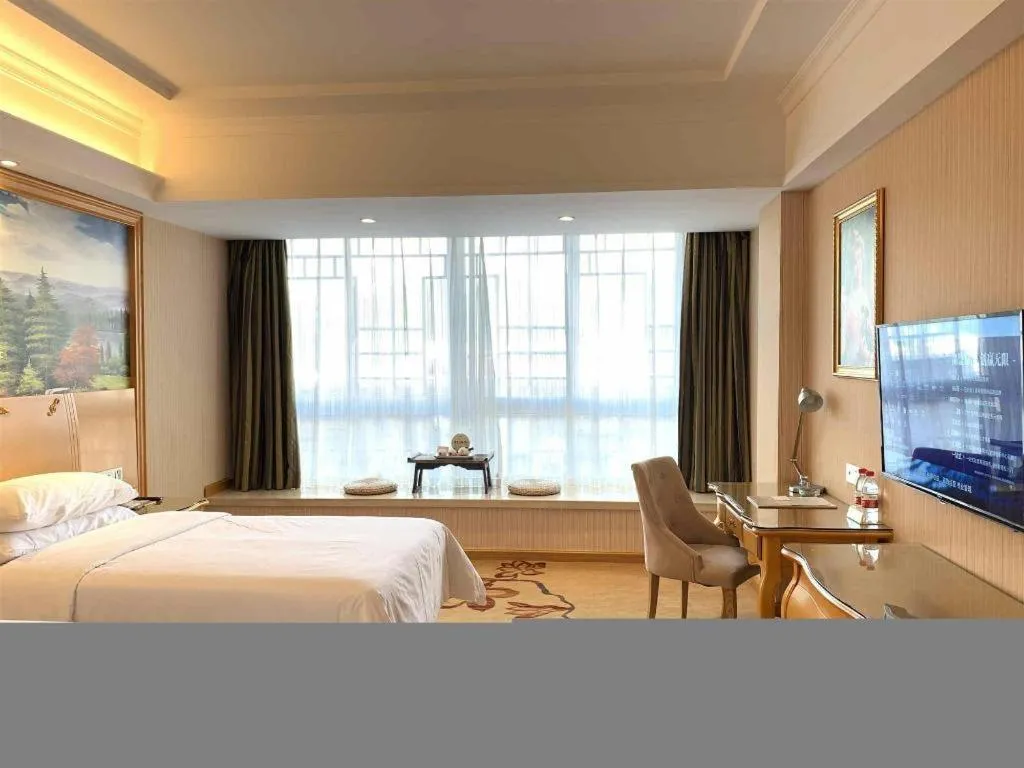 Bed in Vienna Hotel Guangxi Guilin Gongchengtianjie