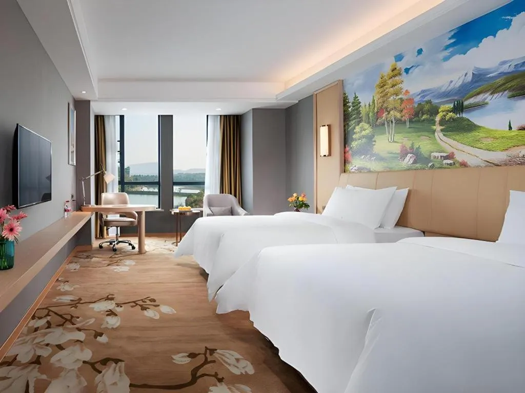 Bed in Vienna Hotel Jiangxi Ji'an Yanjingfu