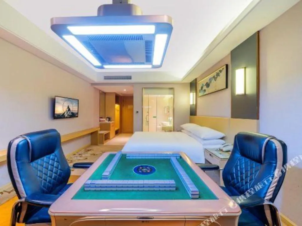 Bed in Vienna Hotel Guangdong Zhongshan Xiaolan High-Speed Railway Station