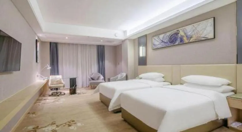 Bed in Vienna Hotel Guangdong Zhongshan Xiaolan High-Speed Railway Station