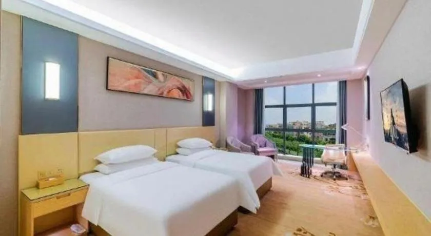 Bed in Vienna Hotel Guangdong Zhongshan Xiaolan High-Speed Railway Station