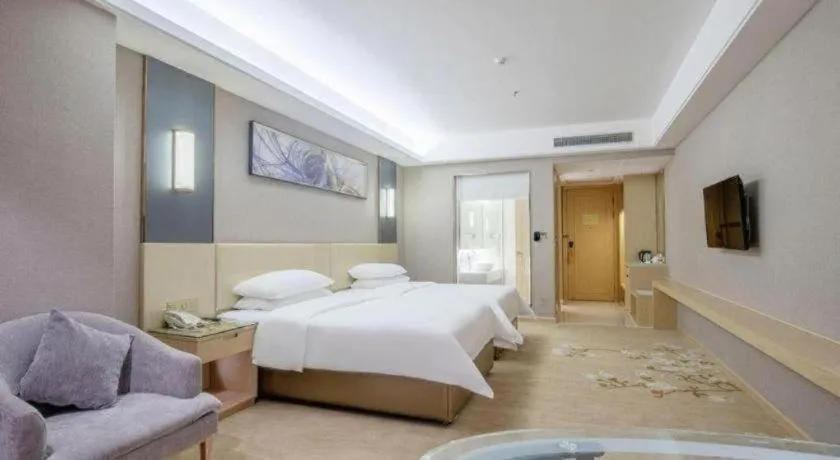 Bed in Vienna Hotel Guangdong Zhongshan Xiaolan High-Speed Railway Station