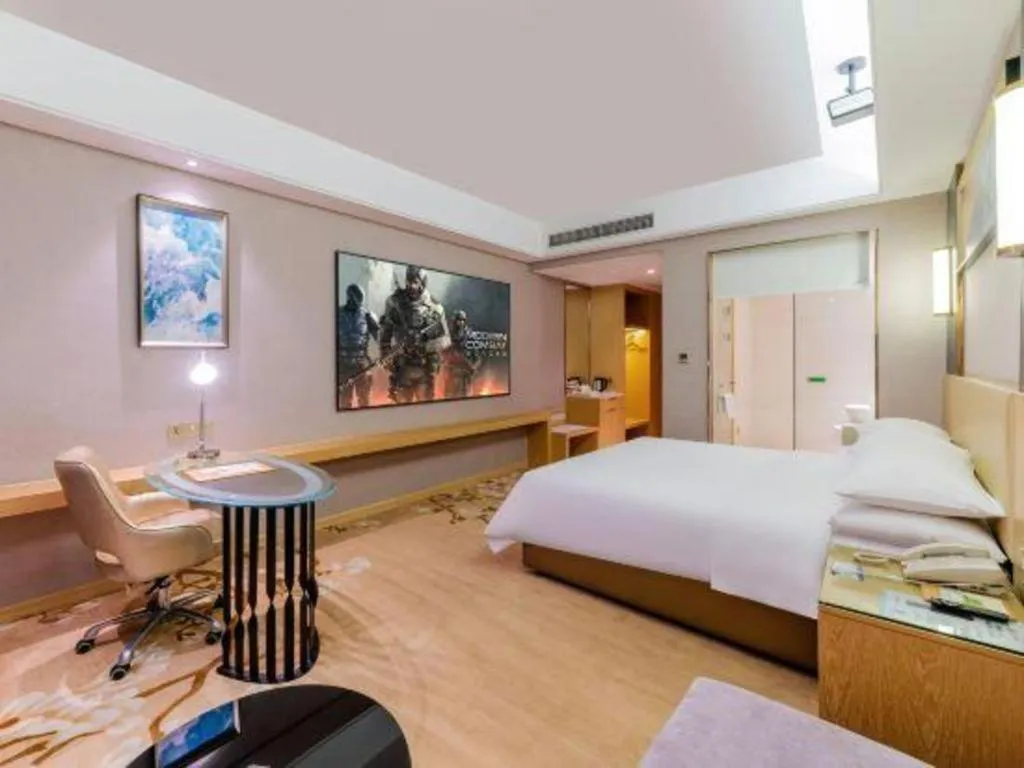 Bed in Vienna Hotel Guangdong Zhongshan Xiaolan High-Speed Railway Station