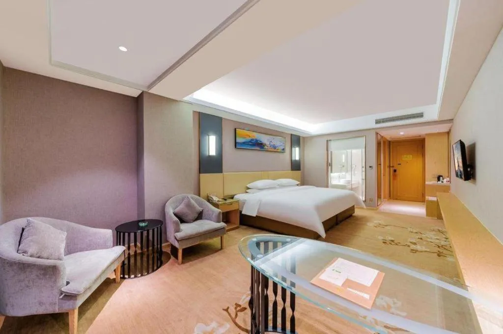 Bed in Vienna Hotel Guangdong Zhongshan Xiaolan High-Speed Railway Station