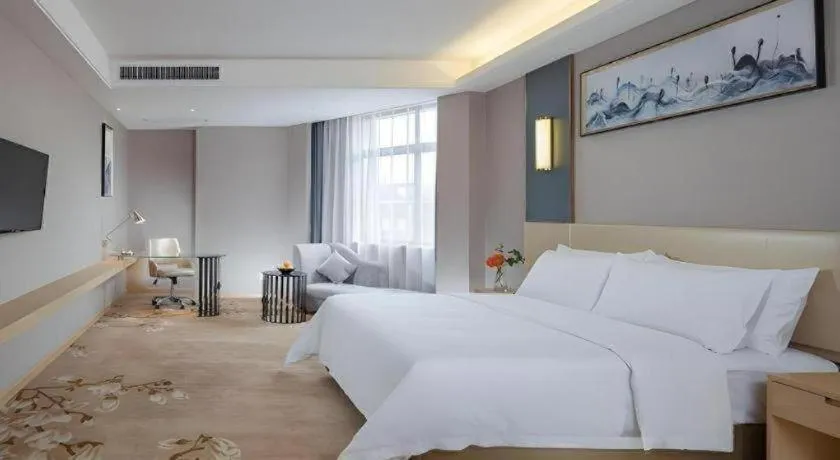Bed in Vienna Hotel Guangdong Zhongshan Xiaolan High-Speed Railway Station
