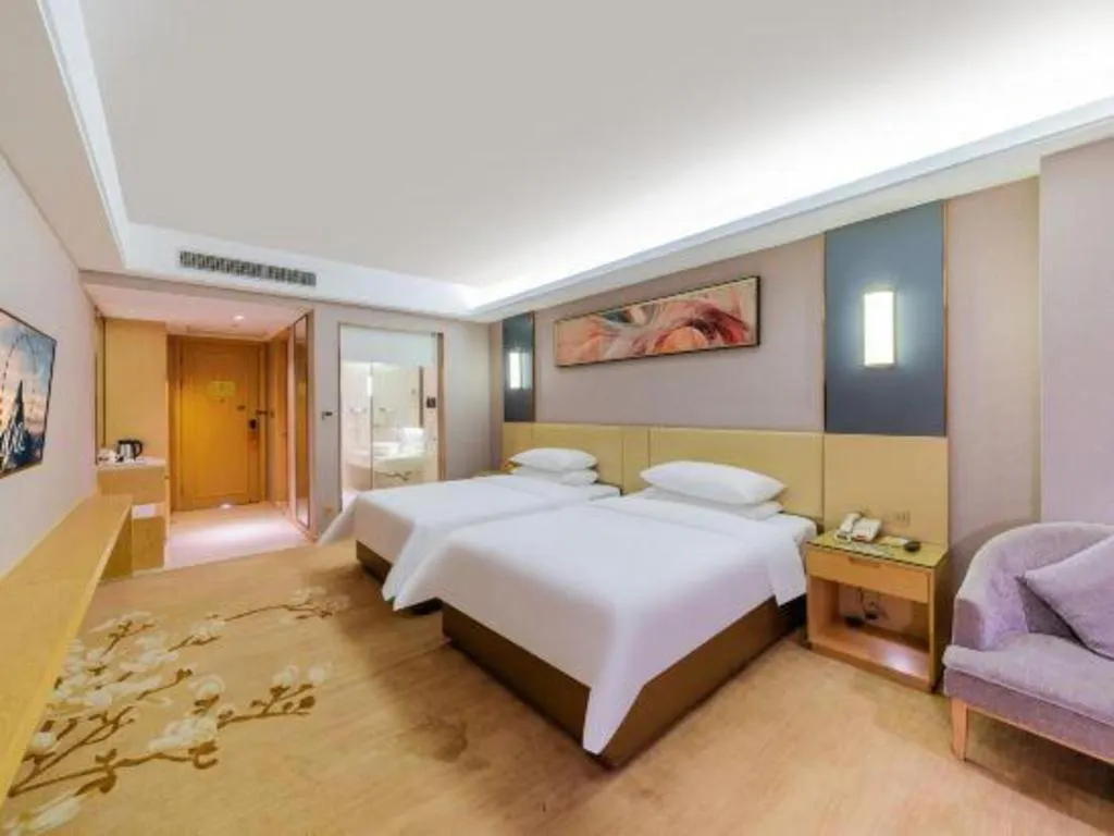 Bed in Vienna Hotel Guangdong Zhongshan Xiaolan High-Speed Railway Station