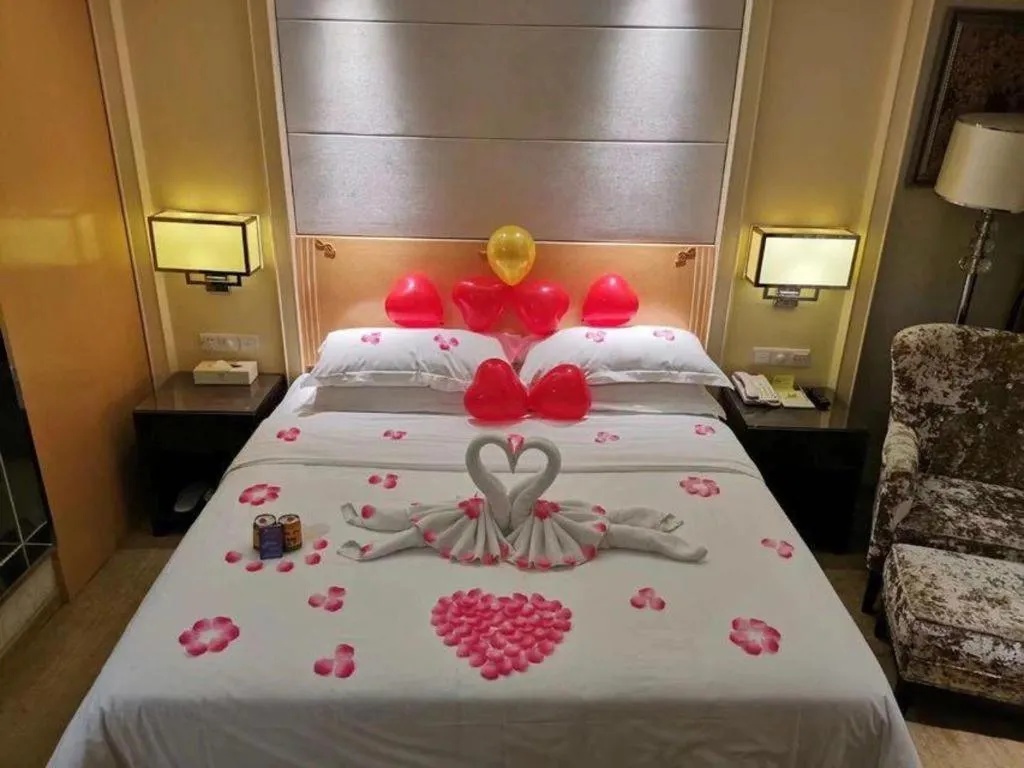 Bed in Vienna Hotel Guangdong Zhongshan Xiaolan High-Speed Railway Station