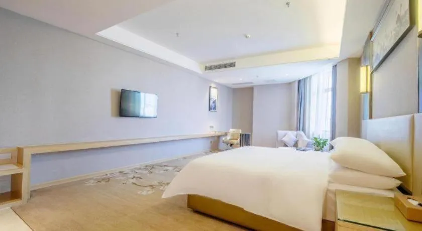 Bed in Vienna Hotel Guangdong Zhongshan Xiaolan High-Speed Railway Station