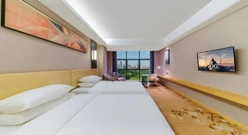 Bed in Vienna Hotel Guangdong Zhongshan Xiaolan High-Speed Railway Station