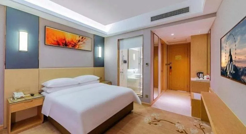 Bed in Vienna Hotel Guangdong Zhongshan Xiaolan High-Speed Railway Station