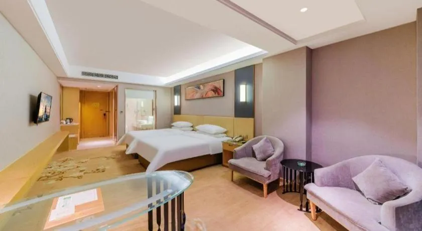 Bed in Vienna Hotel Guangdong Zhongshan Xiaolan High-Speed Railway Station