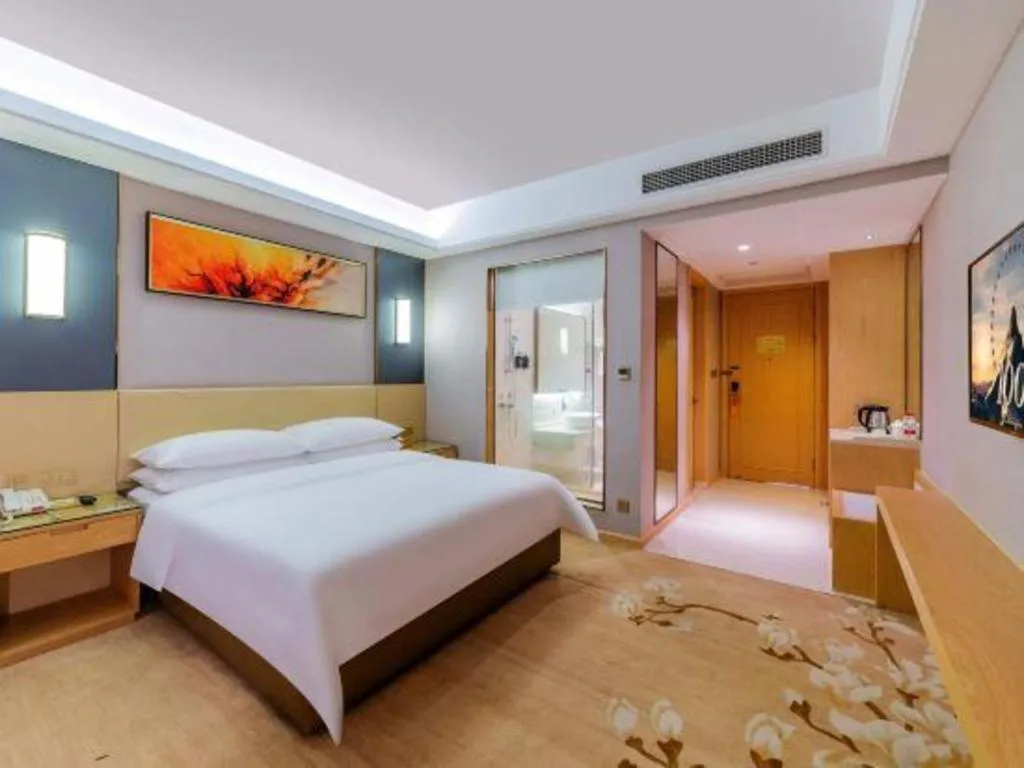 Bed in Vienna Hotel Guangdong Zhongshan Xiaolan High-Speed Railway Station