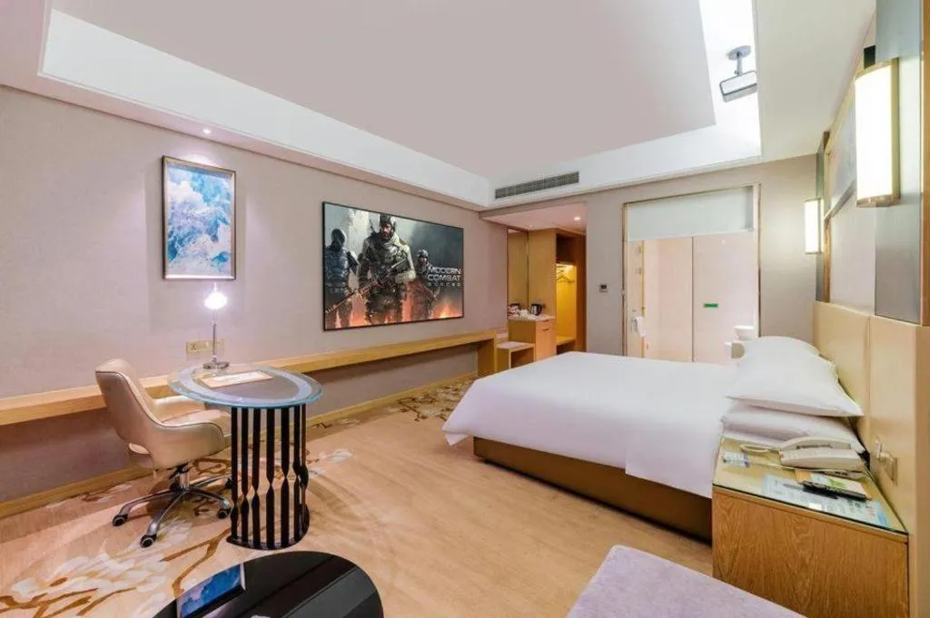 Bed in Vienna Hotel Guangdong Zhongshan Xiaolan High-Speed Railway Station