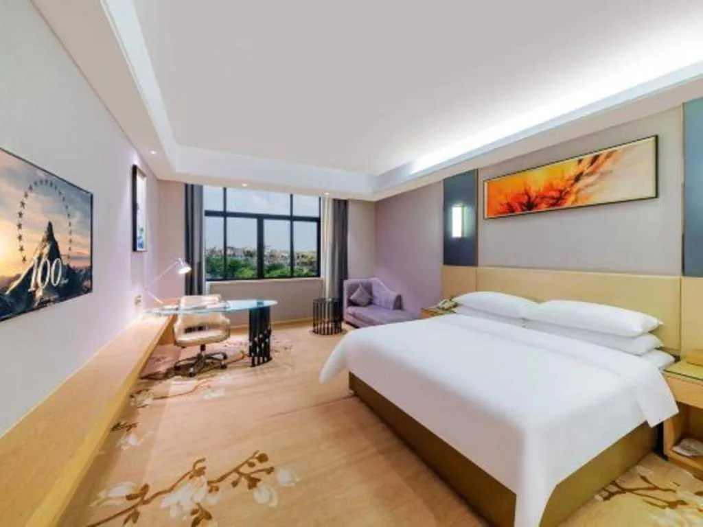 Bed in Vienna Hotel Guangdong Zhongshan Xiaolan High-Speed Railway Station
