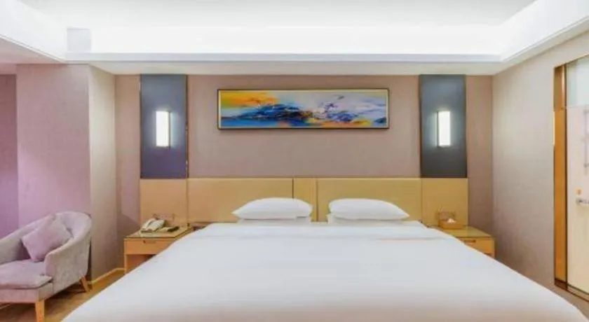 Bed in Vienna Hotel Guangdong Zhongshan Xiaolan High-Speed Railway Station