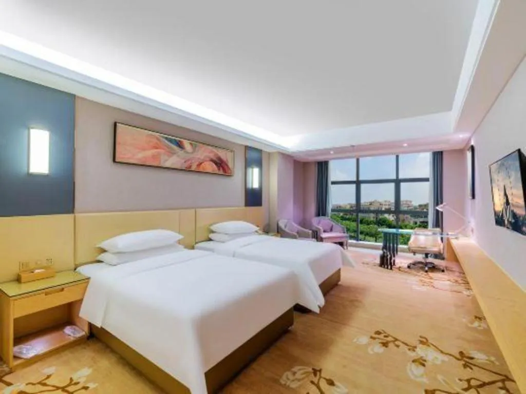 Bed in Vienna Hotel Guangdong Zhongshan Xiaolan High-Speed Railway Station